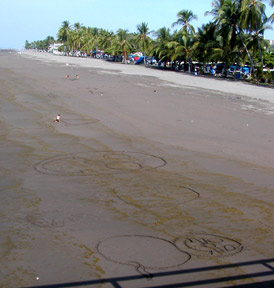sand artist at work puntarenas