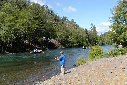 conrad fishing and boats on river