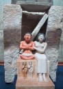 carved family * Tableau of the dwarf Senef, his wife by his side and his children at his feet. From the Old Kingdom. * 309 x 432 * (49KB)