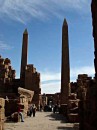 karnak obelisks * The obelisks of Karnak. The one on the right was erected by Tuthmosis II and is 23 meters high (143 tons) and the one on the left was erected by Hatshepsut is over 27 meters and is estimated at 320 tons. * 324 x 432 * (37KB)