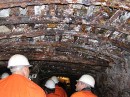ceiling of tunnel * The iron bars supporting the ceiling of the tunnel.  They are dripping with the lime seeping through the tunnels, creating a calcite coating which preserves them without rusting.  So no worry that the ceiling will collapse on our heads! * 432 x 323 * (60KB)