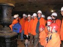 group with stove in mine * Cheryl translating into English the importance of this stove which was cast here from iron from this mine. * 432 x 323 * (55KB)