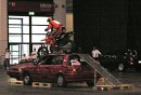 stuntman on car * Stuntman Rainer Schwarz riding over a couple of cars.  Try that in your spare time. * 432 x 295 * (58KB)