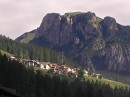 village and mountaintop from fassa * A small mountainside village and towering mountaintop visible from Pozza di Fassa where we stayed. * 432 x 323 * (47KB)