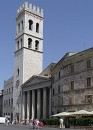 Temple in Piazza * The Temple of Minerva on the main square in Assisi.  The temple was later converted into a church and the bell tower added. * 326 x 452 * (60KB)