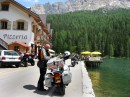 jim at lake misurina * Jim at his bike when we stopped for lunch at Lago di Misurina.  We ate on the little pier seen in the picture.