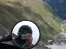 lars in mirror stelvio * Lars taking a self-portrait with a view of the road going down from Passo di Stelvio in Italy.  