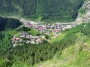 town in valley after fedaia * This town nestled in the valley below is a common sight from many of these mountainous roads.  It is perhaps part of Selva de Cadore.